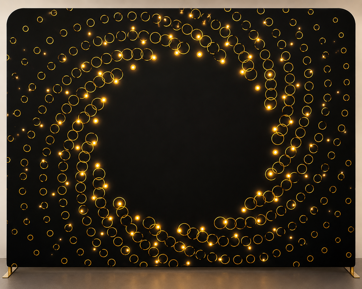 Backdrop of glowing golden rings on a black background